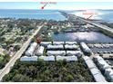 Aerial view of waterfront neighborhood, close to I-275 and Skyway Bridge with marina nearby at 3132 Nautical S Pl, St Petersburg, FL 33712