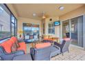 Screened patio with comfortable seating overlooking the pool at 18014 Cozumel Isle Dr, Tampa, FL 33647