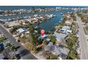 Waterfront home with a private dock, direct access to the canal, and stunning views of the surrounding neighborhood at 505 80Th Ave, St Pete Beach, FL 33706