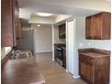 Kitchen with stainless steel appliances and wood cabinets at 734 Climate Dr, Brandon, FL 33511