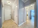 Bright condo entryway with tile flooring and neutral walls at 2724 Via Murano # 633, Clearwater, FL 33764