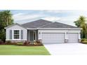 Two-story house with gray siding, two-car garage, and landscaping at 4315 Pullet Ct, Lakewood Ranch, FL 34211