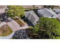 Aerial view showcasing the house and its position on the lot and street at 4666 Helena Ne St, St Petersburg, FL 33703