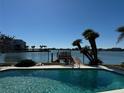 Stunning pool view overlooking the peaceful waterway at 1285 79Th St S, St Petersburg, FL 33707