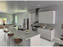 Modern kitchen with stainless steel appliances and an island at 4202 N 15Th St, Tampa, FL 33610