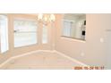 Bright dining area with tile floor and a chandelier at 504 Maple Pointe Dr, Seffner, FL 33584