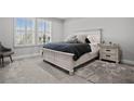 Bright bedroom with carpeted floors and a large window at 5805 Grand Sonata Ave, Lutz, FL 33558