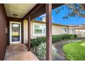 Inviting entryway with brick walkway and covered porch at 5857 25Th S St, St Petersburg, FL 33712