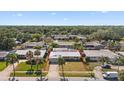 Aerial shot of home with mature trees and landscaping at 1388 S Hercules Ave, Clearwater, FL 33764