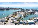 Aerial view of waterfront homes and boats at 326 129Th E Ave, Madeira Beach, FL 33708