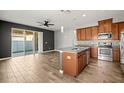 Modern kitchen with stainless steel appliances and island at 4093 71St N Ave, Pinellas Park, FL 33781