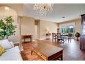 Open floor plan with dining area and view of the pool at 12922 Prestwick Dr, Riverview, FL 33579