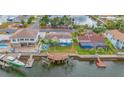 Private dock with boat lift on a canal at 3365 Gulf Coast Dr, Hernando Beach, FL 34607