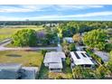 An aerial view of the property showcasing its lush surroundings and neighborhood at 5418 10Th Ave S, Gulfport, FL 33707