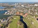 Community overview, showcasing waterfront property and golf course at 1630 Royal Palm S Dr # A, St Petersburg, FL 33707