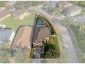 House with pool and fenced backyard in a residential neighborhood at 19301 Sandy Springs Cir, Lutz, FL 33558