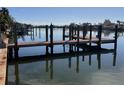 Private dock with water access, perfect for boating and fishing at 4010 Belle Vista Dr, St Pete Beach, FL 33706
