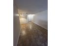 Spacious living room with tile flooring and white walls at 6023 Osprey Lake Cir, Riverview, FL 33578