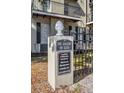 The Gallery on Glen building sign with management info at 609 S Glen Ave # B, Tampa, FL 33609