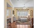 Bright living room featuring hardwood floors and comfy seating at 705 Loma Linda Ct, Brandon, FL 33511