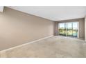 Spacious living room with sliding glass doors and view at 2320 Terra Ceia Bay Blvd # 403, Palmetto, FL 34221
