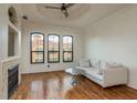 Spacious living area with hardwood floors and large windows at 2749 Via Cipriani # 1032A, Clearwater, FL 33764