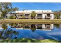 Waterfront condo with a serene pond view from the back and lovely landscaping at 6388 93Rd N Ter # 4603, Pinellas Park, FL 33782