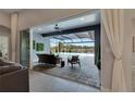 Relaxing indoor patio with pool access at 7506 Parkshore Dr, Apollo Beach, FL 33572