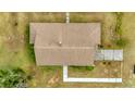 Overhead view of a single story home with brown roof and walkways at 9229 Fort King Rd Rd, Dade City, FL 33525