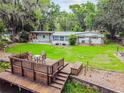 House with large backyard, dock, and water access at 20735 Gardenia Dr, Land O Lakes, FL 34638