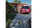 Ranch-style home with a spacious yard and driveway at 5031 S Dr Martin Luther King Jr S St, St Petersburg, FL 33705