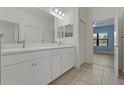 Elegant bathroom with double vanity and ample counter space at 13584 Old Creek Ct, Parrish, FL 34219