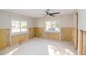 Unfinished bedroom with exposed walls and flooring at 4234 Harrisburg Ne St, St Petersburg, FL 33703