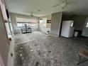 Bright living room featuring several windows and ceiling fans at 2800 47Th S St, Gulfport, FL 33711