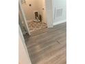 Newly installed light brown wood-look vinyl plank flooring at 670 16Th S Ave, St Petersburg, FL 33701