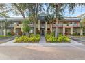 Private balcony overlooking the condo building's exterior at 2296 Monaco Ln # 32, Clearwater, FL 33763