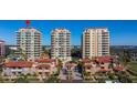 Aerial view of a luxury waterfront condominium complex with multiple towers and lush landscaping at 555 5Th Ne Ave # 621, St Petersburg, FL 33701