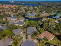 Bird's-eye view showcasing a beautiful waterfront community at 1012 Osprey Ct, Tarpon Springs, FL 34689