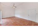 Spacious living area with tile floors and sliding glass doors at 2579 Forest Run Ct, Clearwater, FL 33761
