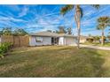 Attractive curb appeal featuring a well-maintained lawn and updated home exterior at 500 Randolph Rd, Venice, FL 34293