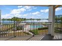 Balcony view overlooking the pool and waterfront at 9815 Harrell Ave # 302, Treasure Island, FL 33706