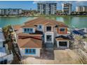 New construction home boasting waterfront location and modern design at 1275 81St S St, St Petersburg, FL 33707