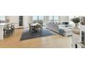 Open living space with hardwood floors and city views at 2910 W Barcelona St # 1901, Tampa, FL 33629