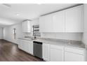 Modern kitchen with stainless steel appliances and granite countertops at 11105 Jenny Wren Rd, Weeki Wachee, FL 34614