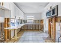 Kitchen undergoing renovation with new countertops installed at 4511 Helena Ne St, St Petersburg, FL 33703