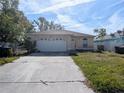 Simple one-story home with a two-car garage at 2060 6Th St, Sarasota, FL 34237