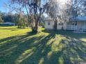 House exterior view, showcasing the front yard at 6658 Williams Rd, Seffner, FL 33584