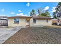 Newly renovated single-story house with front yard at 8840 Cairo Ln, Port Richey, FL 34668