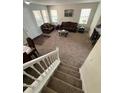 Comfortable living room showcasing cozy sofas, a coffee table, and natural light at 10319 Boyette Creek Blvd, Riverview, FL 33569