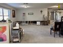 Partially demolished living room with tile flooring and large window at 4549 Ontario Dr, New Port Richey, FL 34652